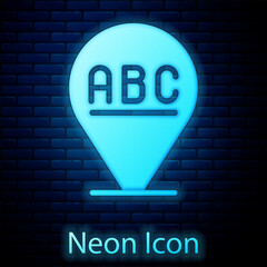 Poster - Glowing neon Alphabet icon isolated on brick wall background. Vector