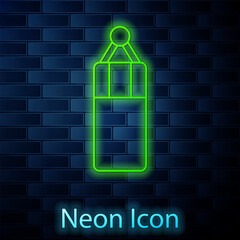 Poster - Glowing neon line Punching bag icon isolated on brick wall background. Vector