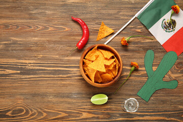 Wall Mural - Composition with Mexican symbols and food for Independence Day on wooden background