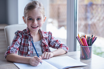 Wall Mural - Cute little schoolgirl