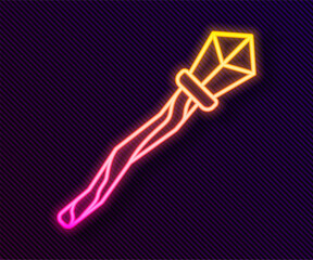 Canvas Print - Glowing neon line Magic staff icon isolated on black background. Magic wand, scepter, stick, rod. Vector