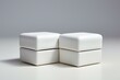 Two white jewelry boxes with open and close lids, placed on a simple background. Generative AI