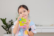 © Tanatpong - little girl is happy Playing colorful block puzzles. in the white room