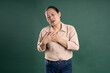 © 1112000 - Gangang middle-aged Asian female portrait posing on blue background