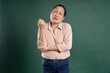 © 1112000 - Gangang middle-aged Asian female portrait posing on blue background
