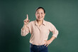 © 1112000 - Gangang middle-aged Asian female portrait posing on blue background