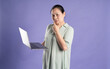 © 1112000 - Gangang middle-aged Asian female portrait posing on purple background