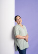 © 1112000 - Gangang middle-aged Asian female portrait posing on purple background
