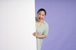 © 1112000 - Gangang middle-aged Asian female portrait posing on purple background