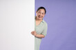 © 1112000 - Gangang middle-aged Asian female portrait posing on purple background