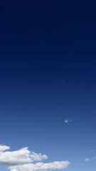Wall Mural - timelapse of clouds on a blue sky on summer sunny day