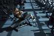 © Westend61 - Strong man doing abdominal exercise in gym