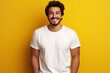 © photobuay - Bella Canvas White Shirt Mockup Stylish Young Man Showcases Design T-Shirt Template Against Vibrant Yellow Background. created with Generative AI
