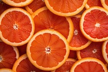 Slices Of Fresh Ripe Sicilian Blood Orange Fruits As A Textural Background, Full Screen Close-up
