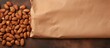 Used brown paper bag contains pack of raisin nuts bread isolated pastel background Copy space