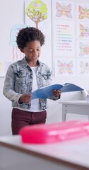 Wall Mural - Child, reading and classroom speech with kid speaker, book and education at a school. Students, learning and notebook with development, knowledge and study with story discussion of youth assessment