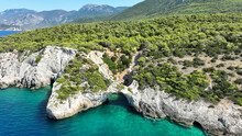 Aerial Drone Photo Of Secluded Paradise Emerald Cave And Beach Called Cave Of The Seals In Perachora, Corinthia, Greece