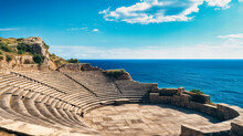 Ancient Greek Amphitheater Overlooking The Sea