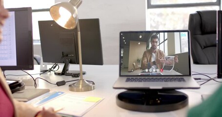 Poster - African american businessman on video call on laptop screen