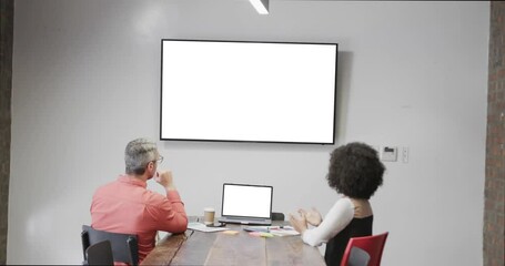 Wall Mural - Diverse business people on video call with blank screen