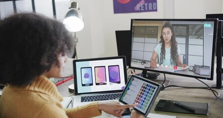 Sticker - African american businesswoman on video call with caucasian female colleague on screen