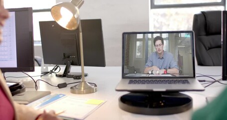 Poster - Laptop with video call with caucasian businessman on screen