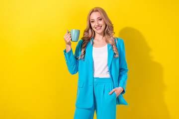 Poster - Portrait of nice gorgeous lady toothy smile arm hold fresh coffee cup isolated on yellow color background