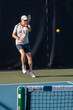 © pics721 - Male Pickleball Player Returns Serve