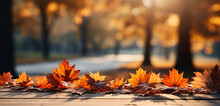 Fallen Leaves In Autumn Colors On The Plank Podium And Detail Of The Sunny Blurred Forest In The Background. Autumn Background Concept. AI Generated.