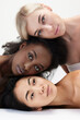 © master1305 - Portrait of three multiracial young women with perfect skin standing against white background against white background. Concept of multi ethnic beauty, natural, spa, cosmetology, wellness, ad