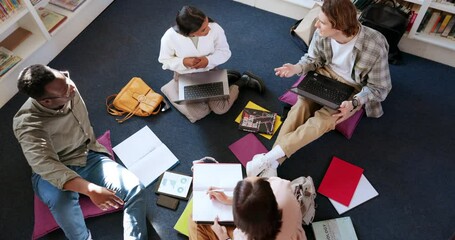 Aufkleber - Students in library, people study together and learning, education and discussion with books and technology. Top view, communication with young men and women, scholarship and academic group work