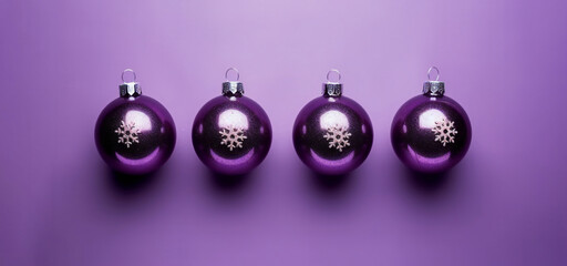 realistic purple christmas balls in a row on purple background
