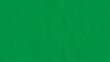 © Song Long - Sheet of crumpled green paper as background, top view. Sheet of color crumpled paper as background. Space for design