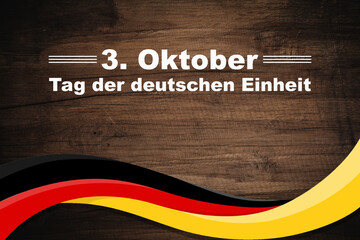 Wall Mural - Germany Unity Day 3rd October. Text on a weaving flag of Germany. Tag der Deutschen Einheit.