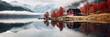 Breiter Banner mit einer Landschaft aus Norwegen im Herbst und Winter. Rotes Haus am See mit Spiegelung und Nebel. Hintergrund Beispiel für Ferienwohnungen in Norwegen und Schweden.