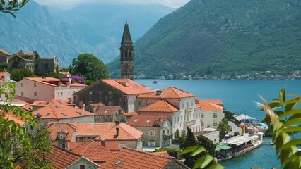 Wall Mural - Aerial view of old town of Perast in the Bay of Kotor on Adriatic sea in Montenegro in sunny day. Popular summer vacation destination