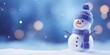 © JW Studio - Christmas winter background with snowman in snow and blurred bokeh background.Merry Christmas and happy new year greeting card with copy space.