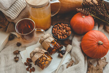 Jars With Craft Sweet Honey And Nuts In Autumn Interior