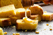 Closeup view at Sweet Honey Butter homemade cornbread slices on kitchen table