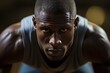 © Dejan - A determined african-american athlete ready to start a marathon run
