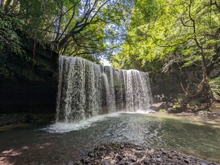 Poster - The Nabegataki Falls, where travelers can access the large cavern behind the falls