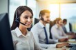 © Viewvie - Customer support agent or call center in headset working at customer service office.