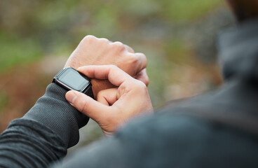 Canvas Print - Hand, time and a man hiking in the forest closeup for freedom, travel or adventure outdoor in nature. Watch, fitness and recreation with a hiker in the woods to discover or explore the wilderness