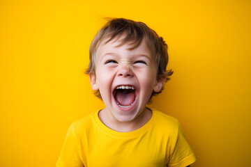 Wall Mural - Studio portrait of a little boy laughing happily, isolated on colorful background. Kids emotions or moods concept. Generative AI