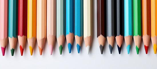 Aufkleber - Close up image of colored pencils on a isolated pastel background Copy space
