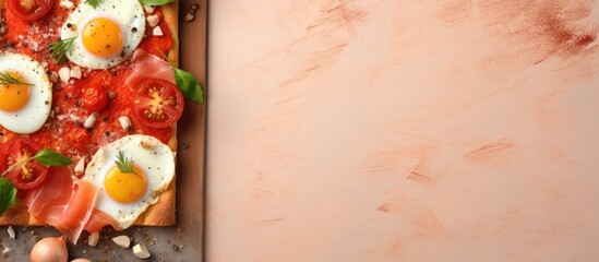 Aufkleber - A delicious and nutritious square bread with chicken eggs ham mayo and oregano tomato sauce on a black textuisolated pastel background Copy space