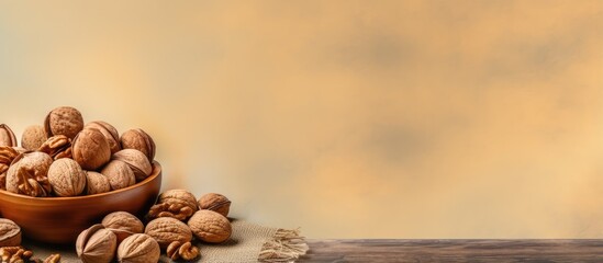 Aufkleber - Walnuts in plate made of wood isolated pastel background Copy space