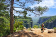 Tazı Canyon known as Eagles Canyon. natural landmark in Antalya district, Turkey. Tourist backpacker women taking photo.
