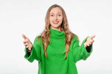 Wall Mural - Lovely, friendly woman spreads her arms for hug, cuddle, stands with open hands and smiles happily, white studio background