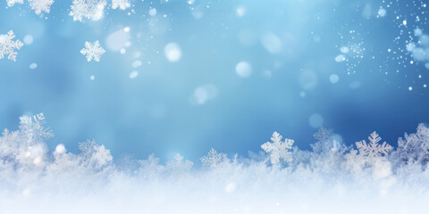 Winter snow background with snowdrifts, with beautiful light and snow flakes on the blue sky, beautiful bokeh circles, banner format, copy space